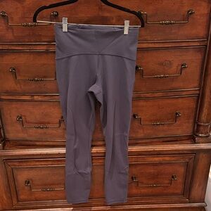 Lululemon High-Waisted Light Navy Blue Leggings Size 6 and 25 inch inseam.
